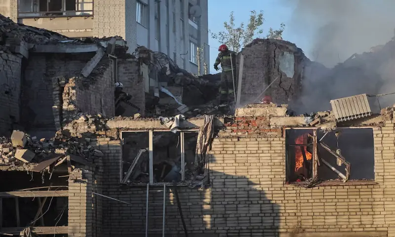 Rescuers work at the site of an apartment building hit by a Russian missile strike in Lviv, Ukraine, on Thursday. -- Reuters Rescuers work at the site of an apartment building hit by a Russian missile strike in Lviv, Ukraine, on Thursday. -- Reuters