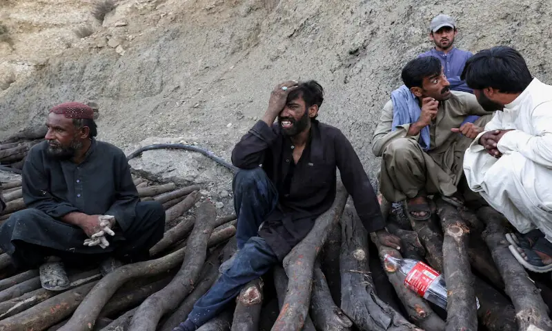 A coal miner grieves for his brother, who was among those trapped after an explosion buried parts of a coal mining complex on the outskirts of Quetta. Reuters