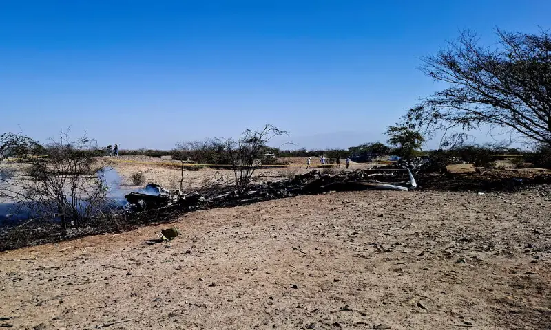 Authorities work in the area where a small aircraft carrying tourists from Germany, Italy and Spain crashed as it flew over the Nazca Lines archaeological site, in Nazca, Peru. -- Reuters