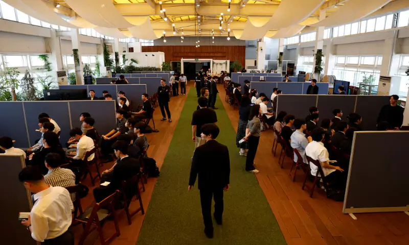 South Korean job seekers attend a job fair connecting them with Japanese employers in Seoul, South Korea. -- Reuters