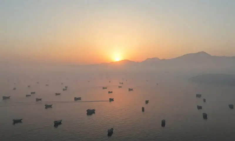 Ships in the Strait of Hormuz seen from Musandam, Oman. -- Reuters