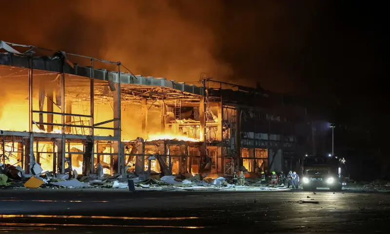Firefighters work at a site of a Russian missile strike in Kyiv, Ukraine. -- Reuters
