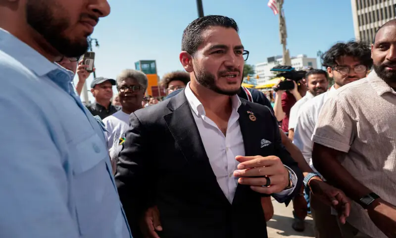 Abdul El Sayed is escorted out following a press conference in Detroit, Michigan. -- Reuters Abdul El Sayed is escorted out following a press conference in Detroit, Michigan. -- Reuters