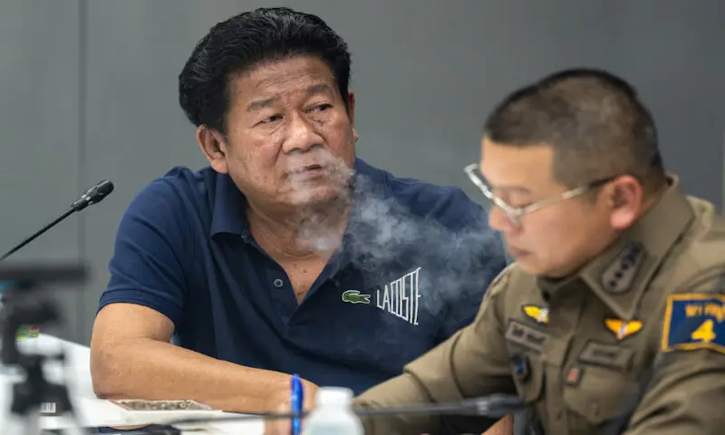 Former lawmaker Chalong Riewrang reacts as he is questioned by police officers after he allegedly shot and killed Thongchai Yenprasert, president of the Nonthaburi Provincial Administrative Organisation, in Nonthaburi province, on the outskirts of Bangkok, Thailand. -- Reuters Former lawmaker Chalong Riewrang reacts as he is questioned by police officers after he allegedly shot and killed Thongchai Yenprasert, president of the Nonthaburi Provincial Administrative Organisation, in Nonthaburi province, on the outskirts of Bangkok, Thailand. -- Reuters