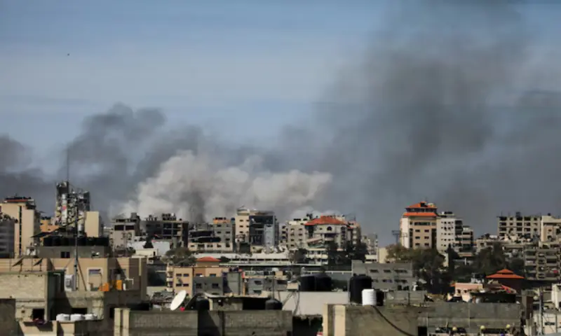 Smoke rises during an Israeli raid at Al Shifa hospital and the area around it, amid the ongoing conflict between Israel and the Palestinian Islamist group Hamas, in Gaza City. -- Reuters