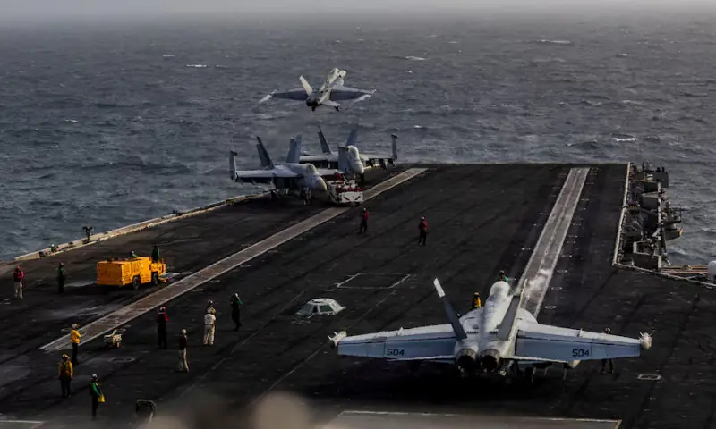 An F/A-18E Super Hornet launches from the flight deck of Nimitz-class aircraft carrier USS Abraham Lincoln during the ongoing conflict with Iran. -- Reuters