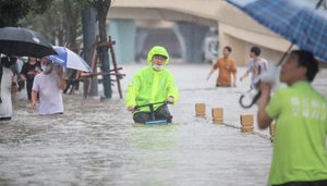 Central China's Henan province swamped after heaviest rain in 1,000 years
