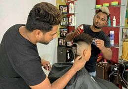 Indian barber siblings turn heads into canvasses by giving unusual haircuts