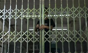 Beijing closes dozens of subway stations as Covid controls tighten