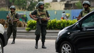 Shoot-on-sight orders in Sri Lanka after deadly violence