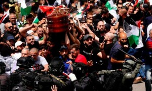 Violence clouds Jerusalem funeral of Al Jazeera journalist