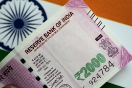 Indian rupee hits record low on Fed rate hike worries
