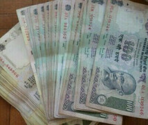 India rupee hits record low on higher global crude prices