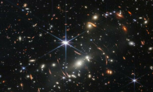 Biden unveils Webb space telescope&rsquo;s first full-color image of distant galaxies