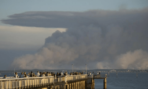 Wildfires blaze across sweltering southwest Europe