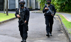 Ten shot dead in ambush in restive Indonesian province: police
