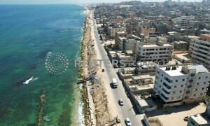 Palestinians strive to stop Gaza shore erosion with concrete and rubble