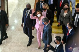 Pelosi defies China threats and lands in Taiwan