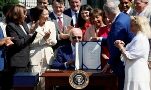 Biden signs bill to boost US chips, compete with China