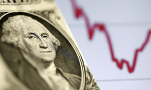 Rupee continues to slide against dollar