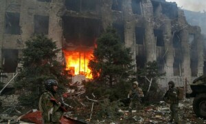 Civilians killed in Ukraine convoy attack as Putin to proclaim rule over seized land