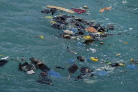 Greece migrant sinkings leave 18 dead, dozens missing