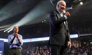 In final midterm push, Biden warns of threats, Trump hints at another run