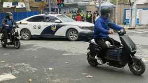 China tightens security after rare protests against COVID curbs