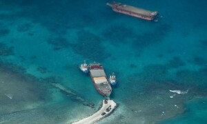 Chinese military says &lsquo;warned&rsquo; US warship to leave S. China Sea