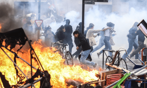 Macron under pressure to find way out of pension crisis after night of clashes