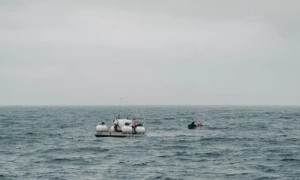 Rescuers in all-night race to save Titanic sub crew