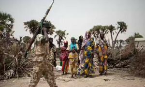 At least 113 killed in attacks in central Nigeria, local official says