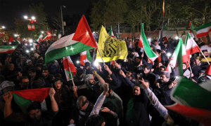 Iranians pour onto the streets in support of attack on Israel