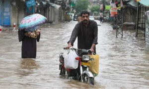 Heavy rain, floods in Pakistan kill at least 30