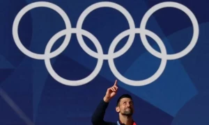 Djokovic fights off Alcaraz to finally strike gold