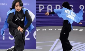 Afghan refugee athlete disqualified for slogan on cape