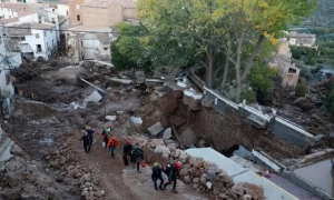 Spanish rescuers race against time as floods claim at least 95 lives