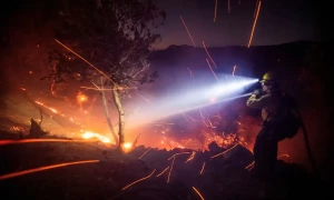 Los Angeles wildfires rage for third night; death toll expected to rise
