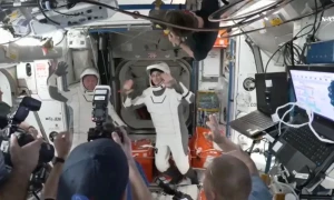 NASA astronauts head home on SpaceX capsule after drawn-out space station stay