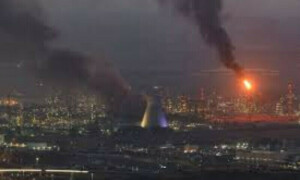 Iran fires dozens of ballistic missiles at Israel, hits power plant