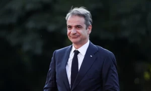 Greek PM says all NATO members should commit to defense spending target
