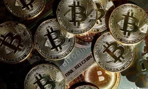 Bitcoin tops $122,000 for first time