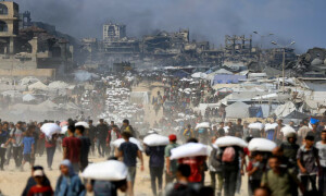 Israeli fire kills 67 Palestinians seeking aid in Gaza