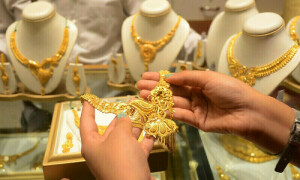 Gold loses ground in Pakistan as international prices fall
