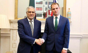 Ishaq Dar discusses Pak-UK ties with British official