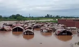 Record-breaking rains trigger urban flooding in Gujrat, jails evacuated as buildings collapse