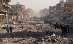 Gazans trek to ruined homes as Israeli forces pull back under ceasefire