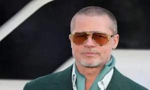 Brad Pitt shows off new longer hair and moustache at world series game