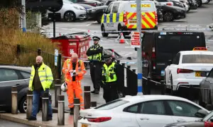 UK train stabbings injure nine, police arrest two suspects
