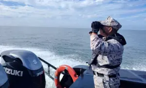 Migrant boat sinks off Malaysia-Thailand border, hundreds missing Migrant boat sinks off Malaysia-Thailand border, hundreds missing